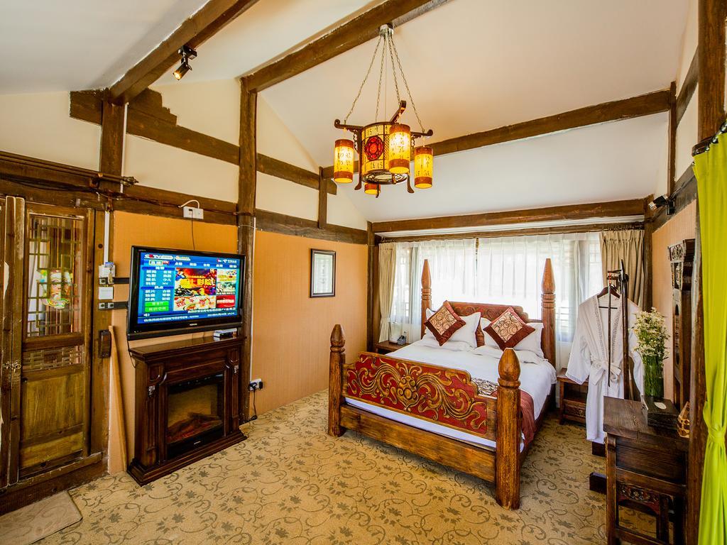Old Tree Boutique Guesthouse Лицзян Экстерьер фото